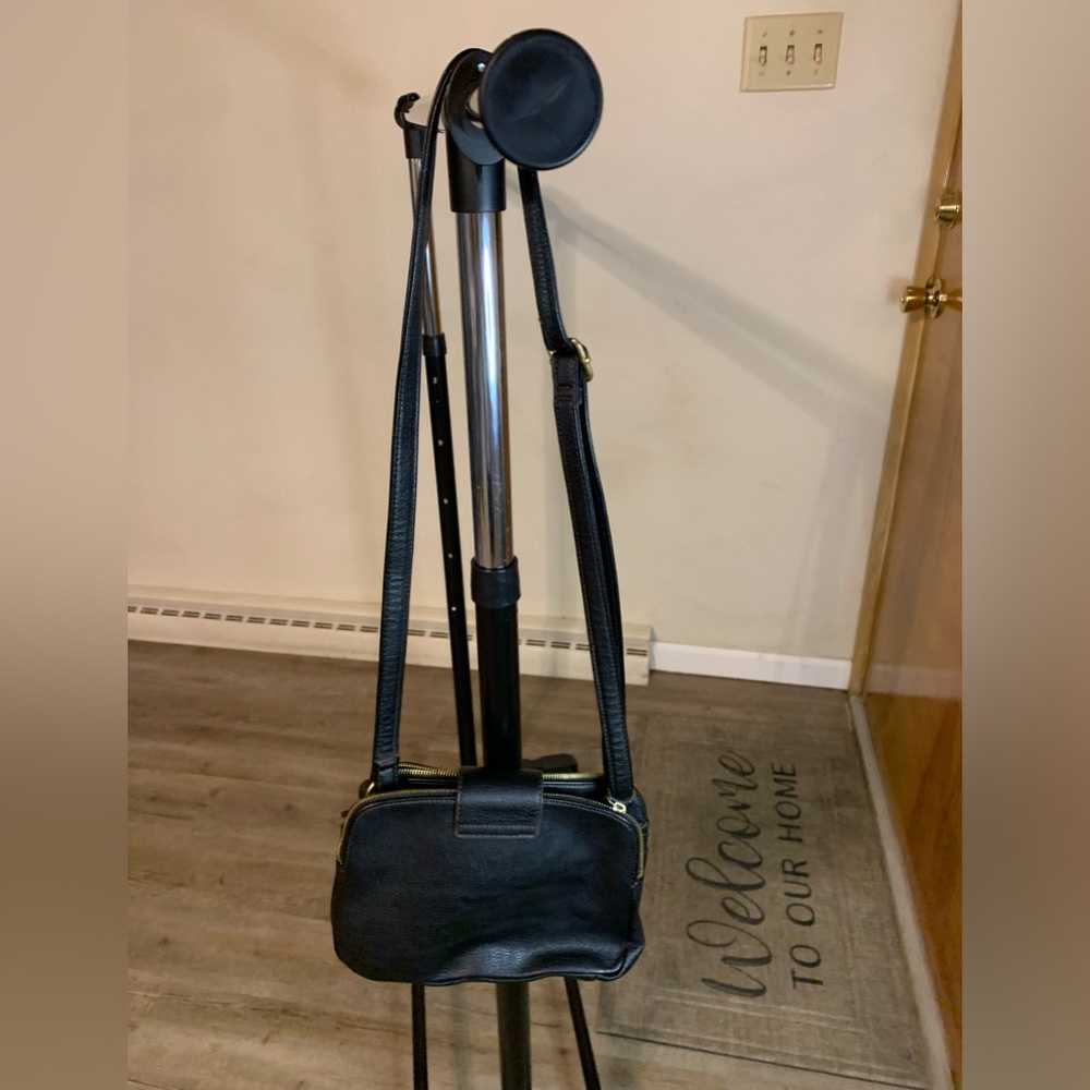 Liz Claiborne crossbody purse with 2 pockets. Color- black